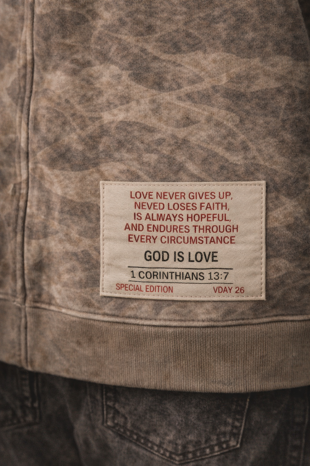 LOVE NEVER FAILS DISTRESSED HEAVYWEIGHT ZIP HOODIE